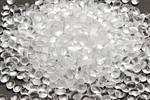 Transparent Polyethylene granules on dark .HDPE Plastic pellets.  Plastic Raw material . IDPE
