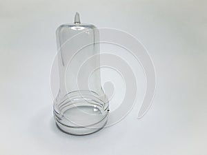 transparent preform isolated on a white background,This polymer is the form before it becomes a plastic bottle