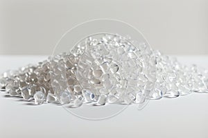 Transparent PVC granulate, recycled plastic granules, biodegradable plastic. Granules of eco-friendly plastic raw