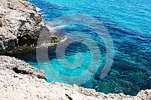 Transparent sea water. Sea caves