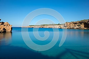 Transparent waters in the cala compte, Ibiza photo