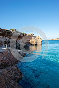 Transparent waters in the cala compte, Ibiza photo