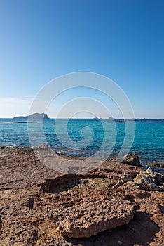 Transparent waters in the cala compte, Ibiza photo