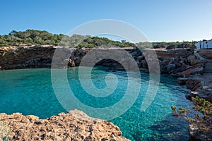 Transparent waters in the cala compte, Ibiza photo