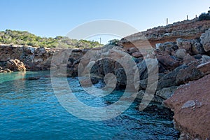 Transparent waters in the cala compte, Ibiza photo