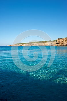 Transparent waters in the cala compte, Ibiza photo