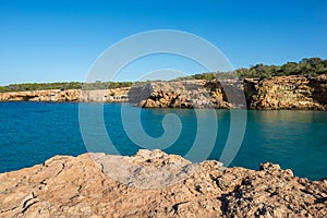 Transparent waters in the cala compte, Ibiza photo