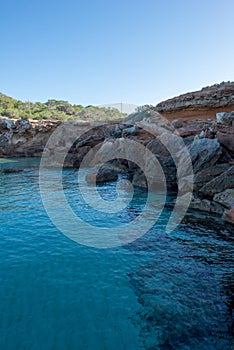 Transparent waters in the cala compte, Ibiza photo