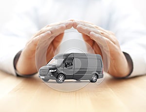 Transport black van car protected by hands