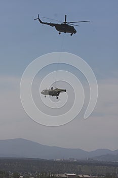 Transport cargo helicopter in the sky