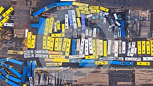 Transport creative art. Yellow and blue buses and cars aerial top view.