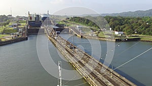 Transport and logistics at sea. Waterways with gates closed and last chambers flooded at Gatun locks, Panama canal