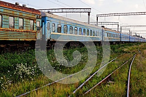 Transport - Side view on the old passenger railroad cars train