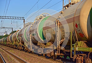 Transport tank car LNG by rail, gas-oil products. LPG transport propane. The fuel train, rolling stock with petrochemical tank