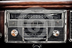 Close-up of retro styled old car radio. vintage revival