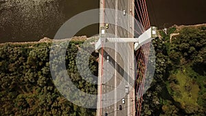 Transportation Aerial of Cars on Big Bridge with Tall Pillars Crossing Large River