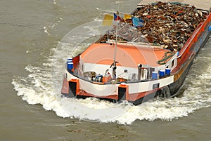 Transportation of metal on a barge