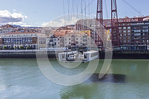 Transportation of people and vehicles across the NerviÃÂ³n River in Spain photo