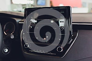 Transportation,technology and vehicle concept - man using car system control pushing panel button touch screen interface