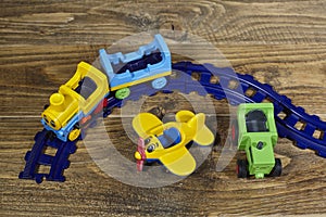 Transportation toys on wooden table