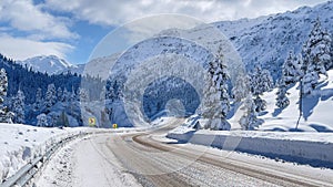 Transportation, traffic and magnificent views on mountainous roads in winter