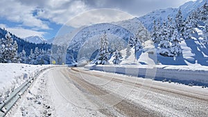 Transportation, traffic and magnificent views on mountainous roads in winter