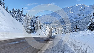 Transportation, traffic and magnificent views on mountainous roads in winter