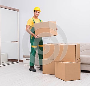 Transportation worker delivering boxes to house