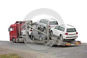 Transporter with cars in the back