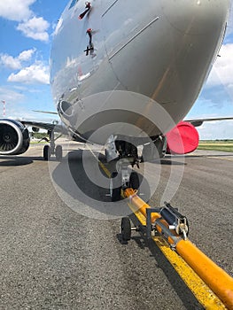 Transporting a large aircraft from a parking
