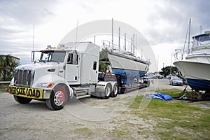 Transporting large sailboat on a flat bed across the country