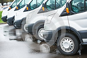 Transporting service company. commercial delivery vans in row photo