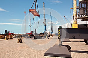 Transshipment terminal for loading steel products to sea vessels using shore cranes and special equipment in Port Pecem, Brazil,