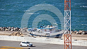 Transshipment terminal for loading steel products to sea vessels using shore cranes and special equipment in Port Pecem, Brazil,