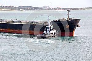 Transshipment terminal for loading steel products to sea vessels using shore cranes and special equipment in Port Pecem, Brazil,