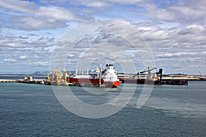 Transshipment terminal for loading steel products to sea vessels using shore cranes and special equipment in Port Pecem, Brazil,