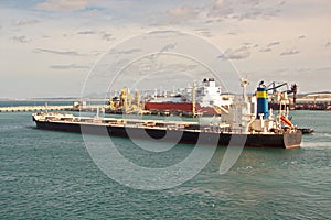 Transshipment terminal for loading steel products to sea vessels using shore cranes and special equipment in Port Pecem, Brazil,