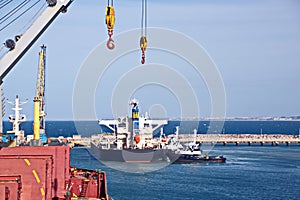 Transshipment terminal for loading steel products to sea vessels using shore cranes and special equipment in Port Pecem, Brazil,
