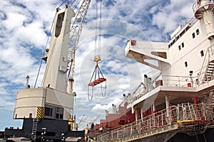 Transshipment terminal for loading steel products to sea vessels using shore cranes and special equipment in Port Pecem, Brazil,