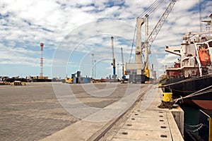 Transshipment terminal for loading steel products to sea vessels using shore cranes and special equipment in Port Pecem, Brazil,