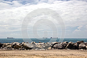 Transshipment terminal for loading steel products to sea vessels using shore cranes and special equipment in Port Pecem, Brazil,