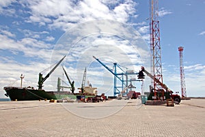 Transshipment terminal for loading steel products to sea vessels using shore cranes and special equipment in Port Pecem, Brazil,