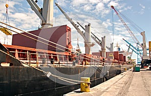 Transshipment terminal for loading steel products to sea vessels using shore cranes and special equipment in Port Pecem, Brazil,