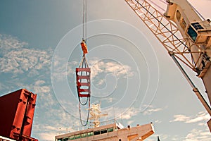 Transshipment terminal for loading steel products to sea vessels using shore cranes and special equipment in Port Pecem, Brazil,