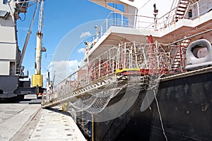 Transshipment terminal for loading steel products to sea vessels using shore cranes and special equipment in Port Pecem, Brazil,