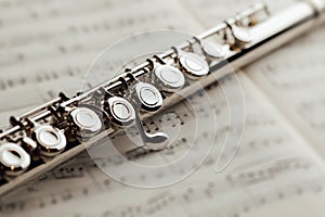 Transverse flute on music sheet