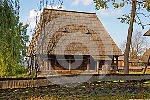 Transylvania household with braided twigs fence