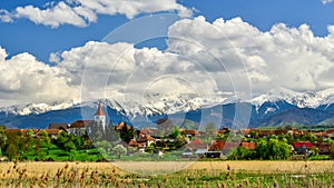 Transylvania village in Romania, in the spring with mountains in the background