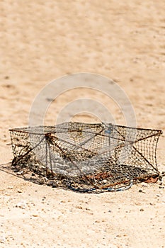 Trap for catching iron crab on the beach asia thailand vertical photo