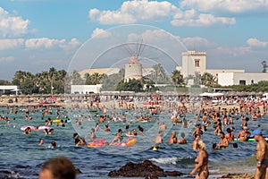 Trapani, San Giuliano beach - August 14 2021: Crowded beaches in August